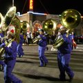 Students in the Rogers High School marching band trek down the street during the 2007 Christmas para...