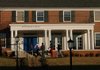 Students enter the Phi Delta Theta fraternity house Thursday on the University of Arkansas at Fayetteville campus. The international fraternity suspended the UA chapter’s charter Wednesday.