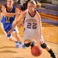 Fayetteville’s Sierra Shipley drives past Mountain Home’s Nicole Bolt during the first half of play ...