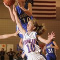 Fayetteville Woodland’s Maggie Stehlik shoots over Springdale George’s Brittany Jurgens during Thurs...