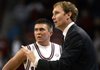 Arkansas Coach John Pelphrey talks things over with guard Rotnei Clarke during Arkansas' game with Appalachian State on Nov. 20 at Bud Walton Arena in Fayetteville.