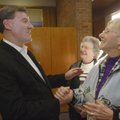 Rob Brothers, who is retiring from Arvest Bank after 30 years, chats with retired bank employees Dor...