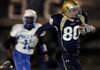 Shiloh Christian wide receiver Jon Hawes runs toward the end zone before being tackled just shy of the goal line in the first half of a Class 4A state semifinal game against Bald Knob on Friday in Champions Stadium in Springdale.