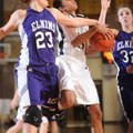 West Fork sophomore forward Melissa Jones, center, pulls down a rebound as Elkins senior forward Mad...