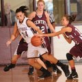 Gentry’s Courtney Millsap, right, tries to knock the ball away from Siloam Springs’ Maci Lewis on Sa...