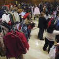 Area residents pick out winter coats Saturday at Southside Church of Christ in Rogers. The church ga...