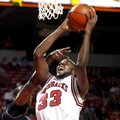Arkansas freshman Marshawn Powell is fouled while going to basket by Delaware State sophomore James ...