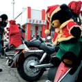 Jerry Grounds of Centerton meets with other bikers Sunday at Heartland Honda in Springdale for the A...