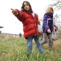 Members of the Ozark World Learners 4-H Club Natalie Darling, center, 8, of Springdale, and friend M...
