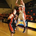 Rogers Heritage senior Hayden Lovelace 
shoots over a Republic (Mo.) defender during second half Tu...
