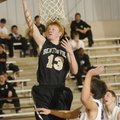Bentonville’s Jonathan Koonce makes a layup Tuesday against Elkins.
