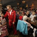 Bill Lazenby, dressed as Elvis, makes his entrance Tuesday at the Retired and Senior Volunteer Progr...