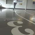 Ida Norman of Bentonville runs laps Wednesday at the Rogers Activity Center on West Olive Street. Te...