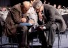 Delegates to the U.N. climate summit confer before Friday’s session in Copenhagen.