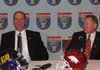 East Carolina Coach Skip Holtz and Arkansas Coach Bobby Petrino talk to reporters prior to the two teams meeting in the Liberty Bowl in January.