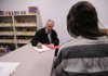Dr. Willard Howard consults with a patient at the Washington County Jail on Monday.