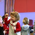 Olivia Miller, 4, of Fayetteville and her brother Ethan shake rattles and dance Thursday during Todd...