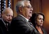 Rep. Barney Frank (center), with Rep. Paul Kanjorski, D-Pa., and House Speaker Nancy Pelosi, talks Friday about the House bill to rein in the financial sector.