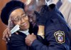 Ruth Budd (left) consoles grandson Orlando Green following Saturday’s memorial service for Green’s sister, Carmeletta, at New Jerusalem Missionary Baptist Church in Little Rock. Green’s sister, and Budd’s granddaughter, disappeared in 1982 at age 12. 