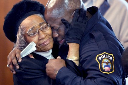 ruth-budd-left-consoles-grandson-orlando-green-following-saturdays-memorial-service-for-greens-sister-carmeletta-at-new-jerusalem-missionary-baptist-church-in-little-rock-greens-sister-and-budds-granddaughter-disappeared-in-1982-at-age-12