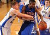 Springdale George’s Dorantez Evans, center, is guarded by Springdale Central’s Junior High’s Tucker Lee, from left, Alex Rice and Hayden Redmond during the first half of Friday’s game in the Coca-Cola Classic in Springdale.