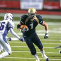 Shiloh Christian fullback Mitchell Roberts, center, carries the ball Saturday as Lonoke defensive ba...