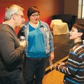 Mitchell Gold, philanthropist and co-founder of Faith in America, left, speaks with Will Phillips, r...