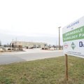 A sign promotes the Springdale Technology Park on Monitor Road.
