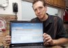 Security researcher Jim Stickley displays logs on his laptop from Internet scams he created for a study.
