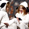 Sheepish players Becca Scheiderer (left), 3, and Abigail Hamrin, 4, portray sheep in the nativity sc...
