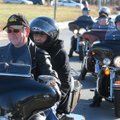 on Cavness, left, of Bentonville, gives Kathryn Browne, 87, of Springdale a ride on his Harley-David...