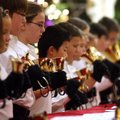 Christmas sounds 
Westin Carroll, 11, of Rogers performs the Ukrainian Bell Carol with other member...