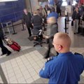 Administration behavior detection officer at Little Rock National Airport, Adams Field, keeps an eye...