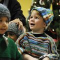 Tristan Lorenz smiles as he wears the hat and sweater Monday made for him by the Sunshine Sweater la...