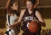 Lincoln’s Rashelle Goldman drives to the basket as West Fork’s Melissa Jones defends during Monday’s nonconference game in West Fork.