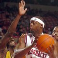 Michael Washington drives to the hoop Wednesday during the first half of Arkansas' 76-51 win over Al...
