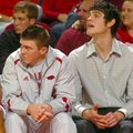Rotnei Clarke, left, and Michael Sanchez did not play Wednesday in Arkansas' 76-51 win over Alabama ...