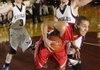 Farmington’s Tyler Haskins struggles to get to the basket while Huntsville’s Joe Burger, left, and Slater Shrum defend during 4A-1 Conference action Tuesday in Huntsville.