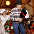 David Clark and his wife, Vaughdeen Clark, of Fayetteville parade Tuesday through the Fayetteville S...