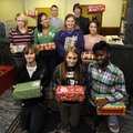 Fayetteville High School LPS Service Learning students delivered gifts as part of the program. Pictu...