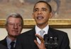 President Barack Obama stands with Senate Finance Committee Chairman Sen. Max Baucus, D-Mont., as he makes a statement on health care reform after meeting with Senators, Tuesday.