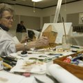 Bobbi Gray of Bella Vista paints Tuesday at The Studio in Bella Vista. Gray is a member of the Villa...