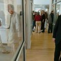 University of Arkansas Chancellor G. David Gearhart (right) tours the new KUAF radio station headqua...