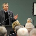 Jerry Mitchell, executive director for the Area Agency on Aging, talks to a crowd Wednesday after th...
