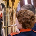 Southwest Junior High School tuba player Casey Self and the rest of the school’s symphonic band play...