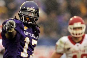 East Carolina's Dwayne Harris (17) celebrates his touchdown during the second half of the NCAA college football Conference USA championship game against Houston in Greenville, N.C.