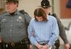 Joel Bullard is led from the Benton County Courthouse Annex on Thursday after a jury found him guilty of first degree murder. Bullard, who represented himself during the trial, was sentenced to life in prison for the murder of his half brother, Darrell Bullard.