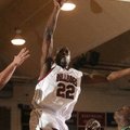 Springdale High’s T.J. Andrews shoots during the first half of Friday’s game against Alma in Springd...