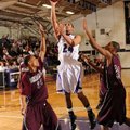ON FIRE
Fayetteville senior guard Taylor Cochran shoots over Sherman’s Trey Jones, left, and Camero...