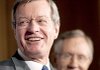 Sen. Max Baucus of Montana (front) and Senate Majority Leader Harry Reid of Nevada talk about the Senate’s health-care bill Monday in Washington.